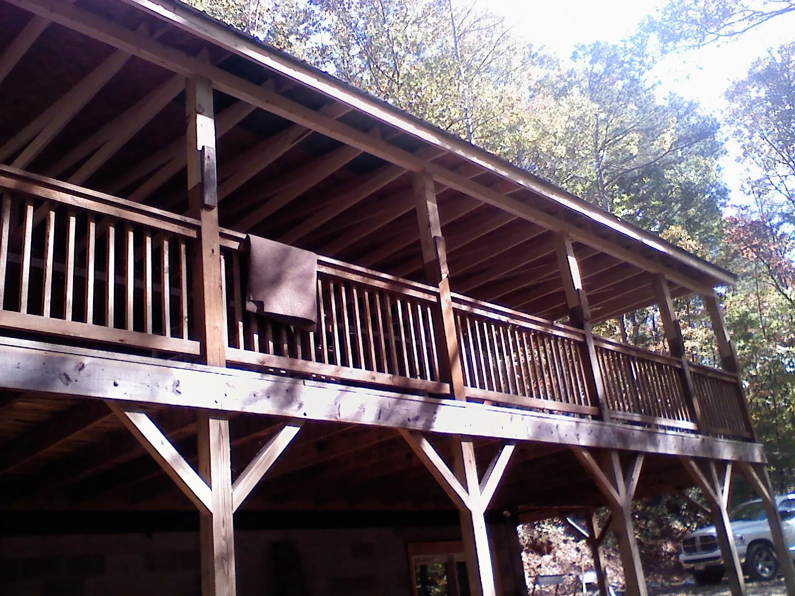 Timber framing under a new elevated porch and deck — Roof Leak Repair in Hoffman by Roofing Brothers